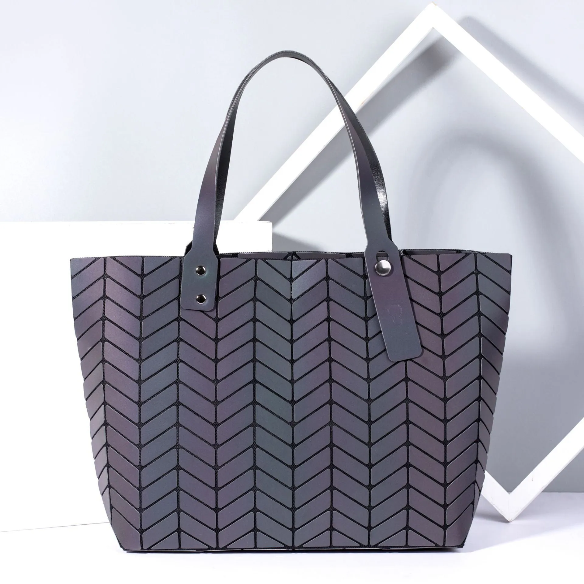 Luminous geometric rhombic handbag